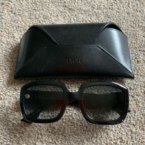 Authentic fashion sunglasses, new with case.
